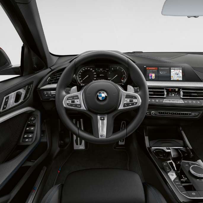 M Leather steering wheel. BMW 1 Series Model M Sport, cockpit with M Leather steering wheel.