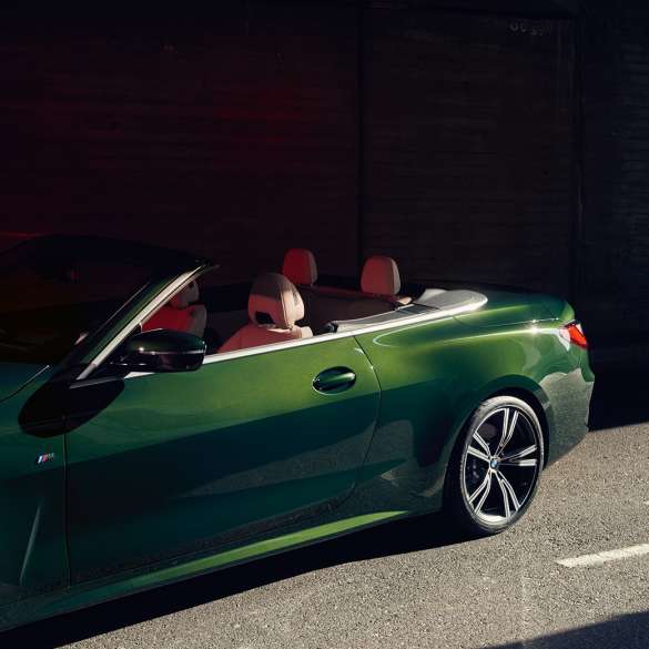 Woman driving a BMW 4 Series Convertible G23 2020 Woman driving a BMW 4 Series Convertible G23 2020 interior