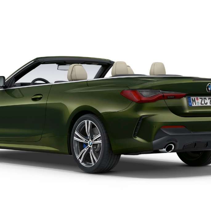 Rear BMW 4 Series Convertible Model M Sport G23 2020 BMW 4 Series Convertible G23 2020 Model M Sport Sanremo Green metallic three-quarter rear view