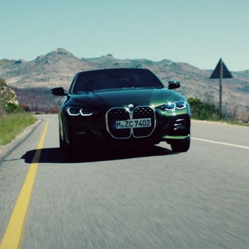 Driving front view BMW 4 Series Convertible G23 2020 BMW 4 Series Convertible G23 2020 Sanremo Green metallic front view driving