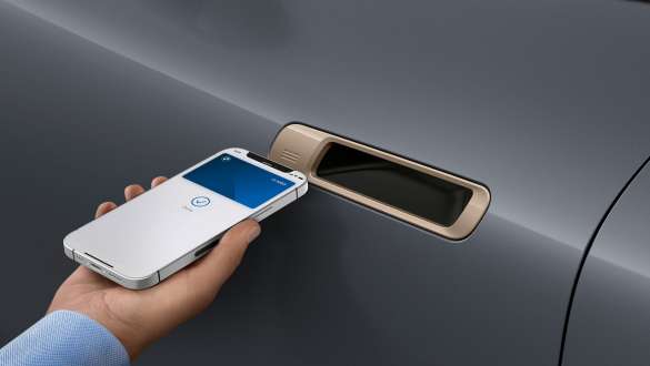 Digital Key Plus BMW iX M60 i20 2022 electric SUV electric car Digital Key Plus BMW iX M60 i20 2022 electric SUV electric car Digital Key Plus smartphone is held next to door handle