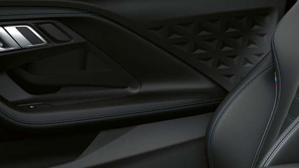 M interior trim BMW M240i xDrive Coupé G42 2021 BMW M240i xDrive Coupé G42 2021 M interior trim door trim panels close-up