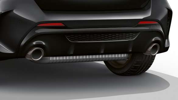 BMW M135i xDrive (F40) Tailpipes in Cerium Grey BMW M135i xDrive (F40) in Black Sapphire metallic rear view with tailpipe trims left and right in Cerium Grey
