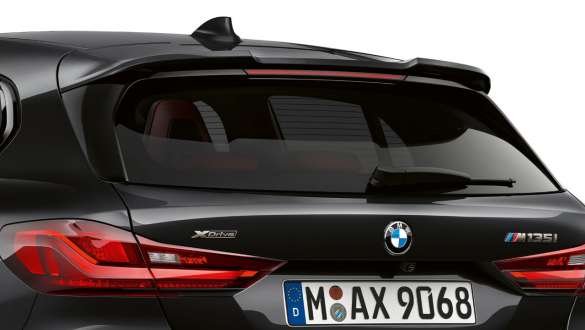 BMW M135i xDrive (F40) M rear spoiler BMW M135i xDrive (F40) in Black Sapphire metallic, rear view with M rear spoiler