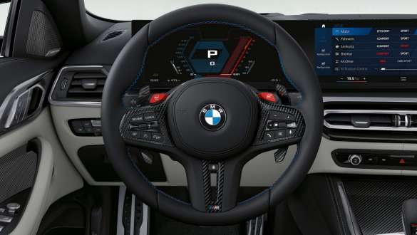 M Carbon steering wheel BMW M4 Competition Convertible with M xDrive G83 2021 BMW M4 Convertible interior Competition G83 2021 interior M Carbon steering wheel cockpit