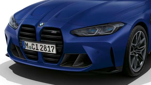 Front design BMW M4 Competition Convertible with M xDrive G83 2021 BMW M4 Competition Convertible with M xDrive G83 2021 BMW Individual Frozen Portimao Blue metallic front design three-quarter front view