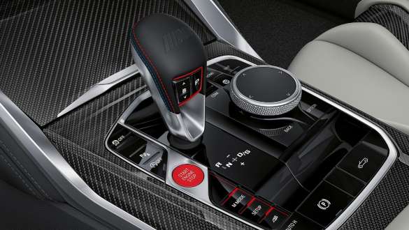 8-speed M Steptronic transmission BMW M4 Competition Convertible with M xDrive G83 2021 BMW M4 Competition Convertible with M xDrive G83 2021 8-speed M Steptronic transmission close-up centre console interior