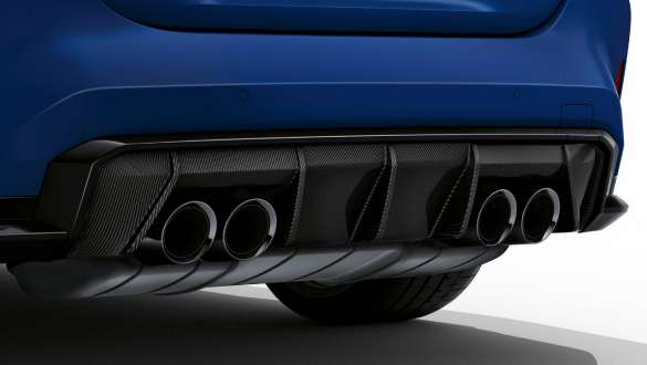 M Sport exhaust system BMW M4 Competition Convertible with M xDrive G83 2021 BMW M4 Competition Convertible with M xDrive G83 2021 Frozen Portimao Blue metallic M Sport exhaust system close-up rear diffusor