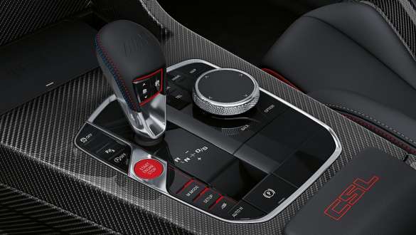 Exclusive centre console featuring lightweight construction BMW M4 CSL G82 BMW M4 CSL G82 close-up exclusive centre console featuring lightweight construction with leather armrest