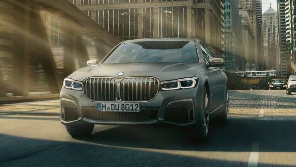 BMW M760Li xDrive Sedan G11 G12 2019 Frozen Dark Silver metallic three-quarter front view in urban setting Executive Drive Pro BMW M760Li xDrive Sedan G11 G12 2019 Frozen Dark Silver metallic three-quarter front view in urban setting Executive Drive Pro