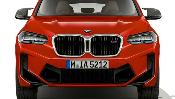 Front design BMW X4 M F98 LCI Facelift 2021 BMW X4 M F98 LCI Facelift 2021 Toronto Red Metallic front design front view