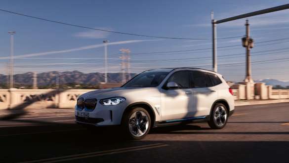 BMW IconicSounds Electric BMW iX3 G08 BMW IconicSounds Electric BMW iX3 G08 2020 driving on street