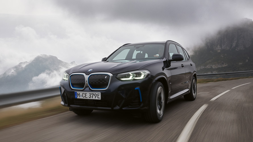 BMW iX3 G08 first generation three-quarter front view driving BMW i Series BMW iX3 G08 first generation three-quarter front view driving