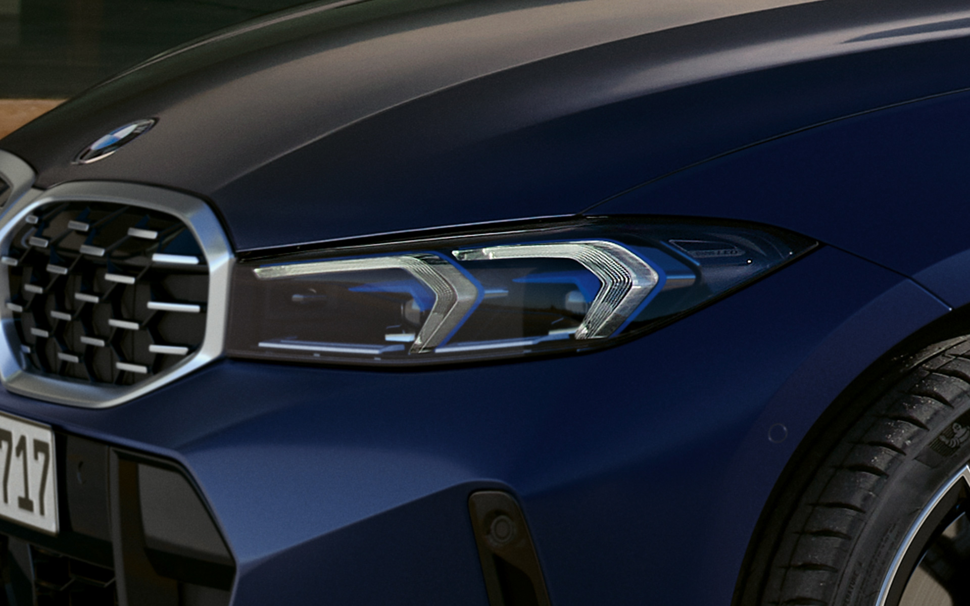 BMW M340i xDrive Touring G21 Frozen Tanzanite Blue LED front lights close-up BMW M340i xDrive Touring G21 Frozen Tanzanite Blue LED front lights close-up