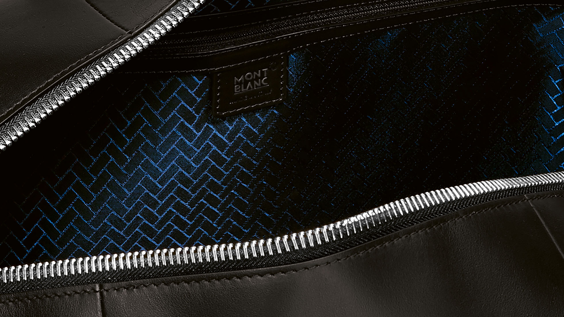 Montblanc for BMW Duffle Bag. The picture shows a close-up view of the patterned surface of the Montblanc for BMW Duffle Bag.