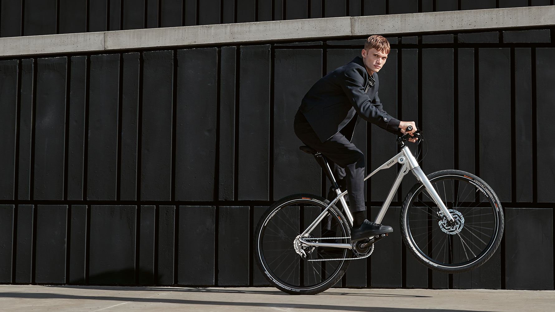 A man rides a curve on a BMW Cruise Bike. A man rides a curve on a BMW Cruise Bike.