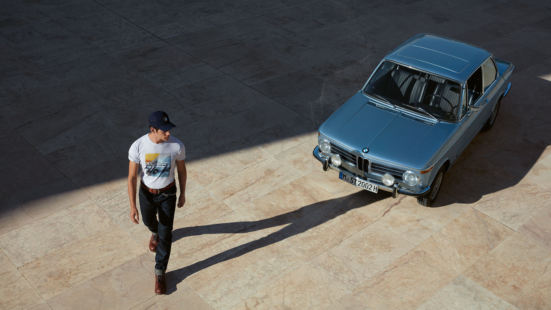 A male model and a classic BMW represent the design concept of the BMW Classic Collection. A male model and a classic BMW represent the design concept of the BMW Classic Collection.