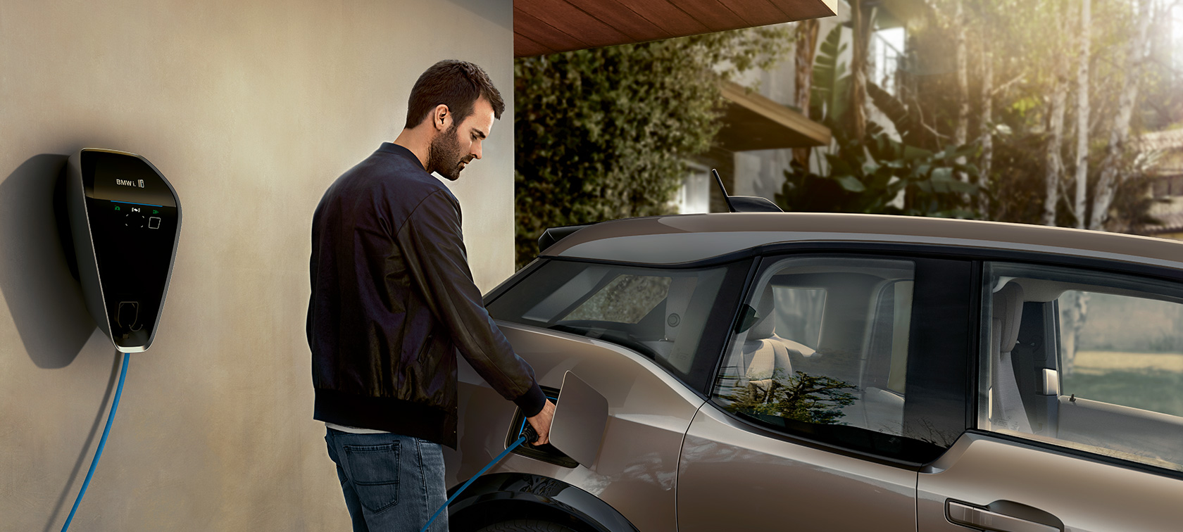 BMW i3s man at charging station BMW charging BMW i3s man at charging station