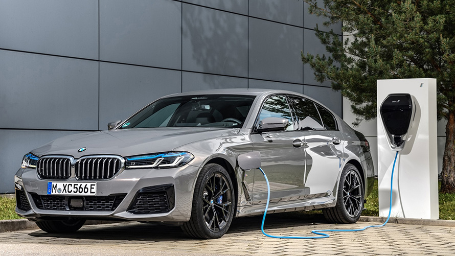 BMW Remote Software Upgrade BMW hybrid vehicle at charging station BMW Remote Software Upgrade BMW hybrid vehicle at charging station three-quarter front view