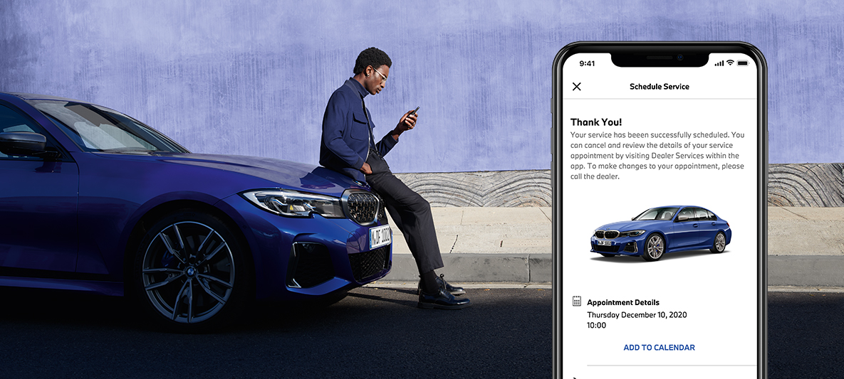 My BMW App manage my service experience man sitting on a bonnet of a BMW My BMW App manage my service experience man sitting on a bonnet of a BMW